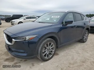 2021 Mazda CX-5 Signature with VIN JM3KFBEY9M0343758, listed as a Copart auction lot 46469785 with 41,757 mi miles and Salvage Title. Bid and sale history available at carsss.com. Image 1.