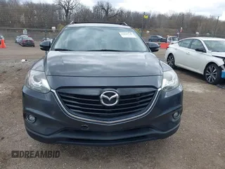 2015 Mazda CX-9 Grand Touring with VIN JM3TB3DV1F0465966, listed as a IAAI auction lot 42049749 with 74,470 mi miles and . Bid and sale history available at DreamBid. Image 12.