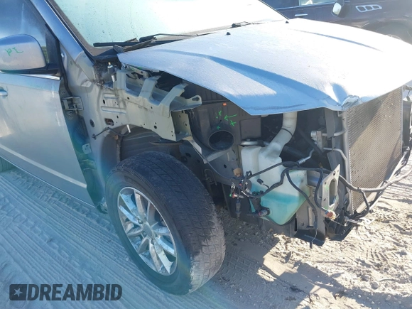 2018 Dodge Grand Caravan SXT with VIN 2C4RDGCG5JR267428, listed as a IAAI auction lot 41877661 with 103,633 mi miles and . Bid and sale history available at DreamBid. Image 6.