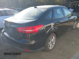 2015 Ford Focus SE with VIN 1FADP3F29FL210973, listed as a IAAI auction lot 41874367 with 128,705 mi miles. Bid and sale history available at carsss.com. Image 4.