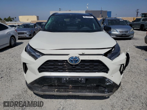 2022 Toyota RAV4 Hybrid XSE с VIN 4T3E6RFV6NU086056, выставлен на аукционе Copart как лот 60143275 с пробегом 37 948 миль миль и Списание • Salvage title. История ставок и продаж доступна на DreamBid. Изображение 5.