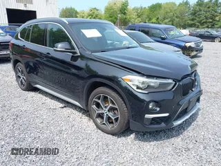 2018 BMW X1 xDrive28i with VIN WBXHT3C32J5L31106, listed as a IAAI auction lot 42364167 with 52,004 mi miles and . Bid and sale history available at DreamBid. Image 1.