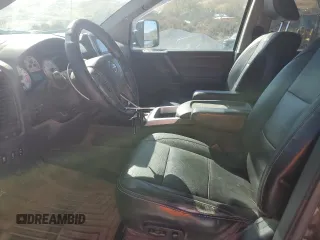 2014 Nissan Titan S with VIN 1N6AA0EC1EN510658, listed as a Copart auction lot 75210054 with Not Provided miles and Salvage Title. Bid and sale history available at DreamBid. Image 7.