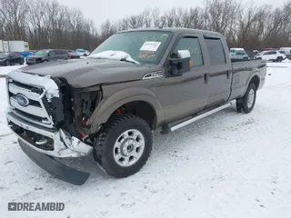 2015 Ford Super Duty F-250 SRW Lariat with VIN 1FT7W2B6XFEA43802, listed as a IAAI auction lot 41076297 with 202,520 mi miles. Bid and sale history available at carsss.com. Image 2.