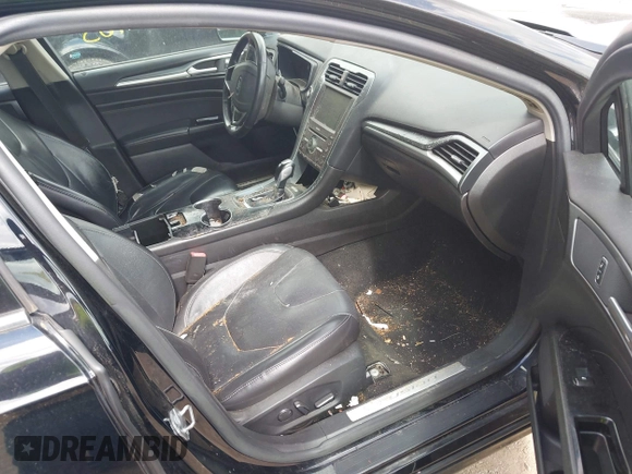 2016 Ford Fusion Titanium with VIN 3FA6P0K97GR135106, listed as a IAAI auction lot 42269165 with 155,036 mi miles and . Bid and sale history available at DreamBid. Image 5.