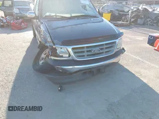 2002 Ford F-150 XL with VIN 1FTRX17L52NA85965, listed as a IAAI auction lot 41796633 with 171,814 mi miles. Bid and sale history available at carsss.com. Image 6.
