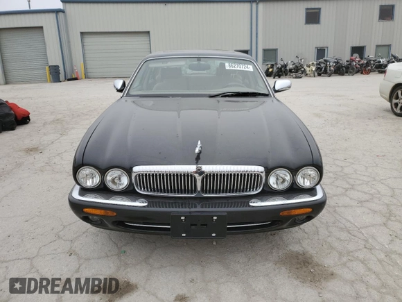 1999 Jaguar XJ z VIN SAJKD6043XC872105, wystawiony jako Copart lot #86270724 z przebiegiem Nie podano mil oraz Szkoda całkowita • Salvage title. Historia ofert i sprzedaży dostępna na DreamBid. Obrazek 5.