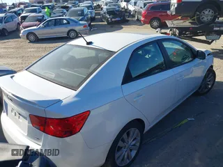 2013 Kia Forte SX with VIN KNAFW4A36D5663328, listed as a IAAI auction lot 41294354 with 172,637 mi miles. Bid and sale history available at carsss.com. Image 4.