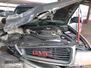 2001 GMC Jimmy SL with VIN 1GKCS13WX12222794, listed as a IAAI auction lot 41949569 with 169,961 mi miles. Bid and sale history available at carsss.com. Image 10.