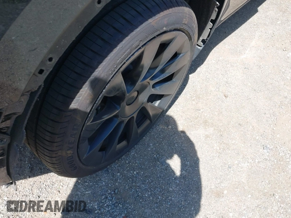2023 Tesla Model Y Long Range with VIN 7SAYGDEE0PA111430, listed as a IAAI auction lot 42156924 with 35,950 mi miles and . Bid and sale history available at DreamBid. Image 12.