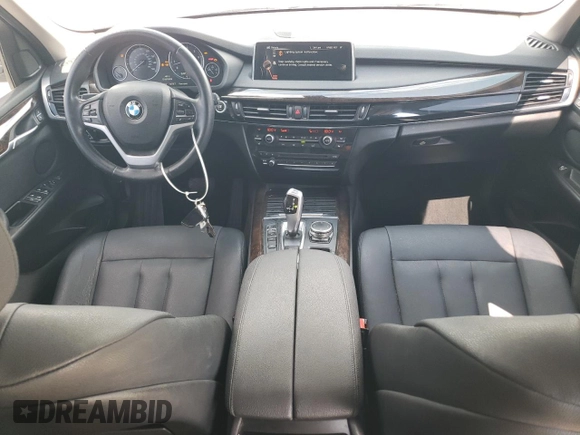 2016 BMW X5 xDrive35i z VIN 5UXKR0C52G0P26716, wystawiony jako Copart lot #56028275 z przebiegiem 128 355 mil mil oraz Szkoda całkowita • Salvage title. Historia ofert i sprzedaży dostępna na DreamBid. Obrazek 8.