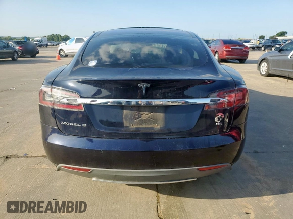 2014 Tesla Model S 60 с VIN 5YJSA1H16EFP50018, выставлен на аукционе Copart как лот 64372605 с пробегом 165 910 миль миль и Списание • Salvage title. История ставок и продаж доступна на DreamBid. Изображение 6.