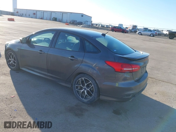 2016 Ford Focus SE with VIN 1FADP3F27GL374188, listed as a IAAI auction lot 41738121 with 125,229 mi miles. Bid and sale history available at carsss.com. Image 3.