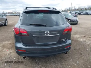 2015 Mazda CX-9 Grand Touring with VIN JM3TB3DV1F0465966, listed as a IAAI auction lot 42049749 with 74,470 mi miles and . Bid and sale history available at DreamBid. Image 16.