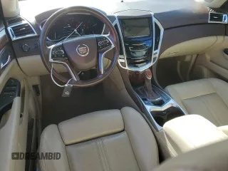 2014 Cadillac SRX Premium Collection z VIN 3GYFNGE34ES662777, wystawiony jako Copart lot #56559285 z przebiegiem 131 136 mil mil oraz Szkoda całkowita • Salvage title. Historia ofert i sprzedaży dostępna na DreamBid. Obrazek 8.