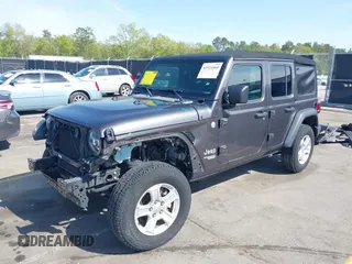 2020 Jeep Wrangler Unlimited Sport Altitude with VIN 1C4HJXDG7LW215344, listed as a IAAI auction lot 41924460 with 51,802 mi miles and . Bid and sale history available at DreamBid. Image 2.