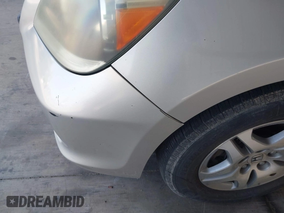 2005 Honda Odyssey EX-L with VIN 5FNRL38705B106488, listed as a IAAI auction lot 42545141 with 199,619 mi miles and . Bid and sale history available at DreamBid. Image 14.