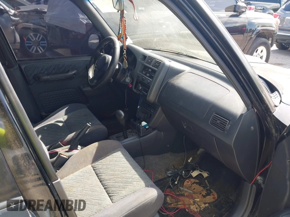 1998 Toyota RAV4 with VIN JT3GP10V7W7037711, listed as a IAAI auction lot 42081313 with 233,554 mi miles and . Bid and sale history available at DreamBid. Image 5.