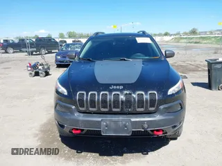 2018 Jeep Cherokee Trailhawk Leather Plus with VIN 1C4PJMBXXJD572667, listed as a IAAI auction lot 42216477 with 85,890 mi miles and . Bid and sale history available at DreamBid. Image 12.