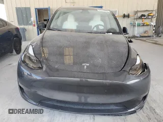 2024 Tesla Model Y с VIN 7SAYGDED3RF044335, выставлен на аукционе Copart как лот 58263265 с пробегом Не указан миль и Списание • Salvage title. История ставок и продаж доступна на DreamBid. Изображение 5.