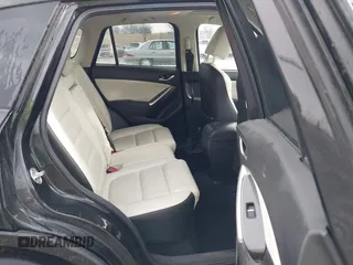 2016 Mazda CX-5 Grand Touring with VIN JM3KE4DY3G0769448, listed as a IAAI auction lot 41947725 with 154,051 mi miles and . Bid and sale history available at carsss.com. Image 8.