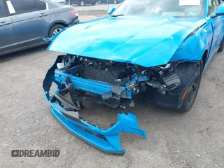 2024 Ford Mustang EcoBoost z VIN 1FAGP8UH8R5129750, wystawiony jako IAAI lot #42779808 z przebiegiem 20 652 mil mil oraz . Historia ofert i sprzedaży dostępna na DreamBid. Obrazek 6.