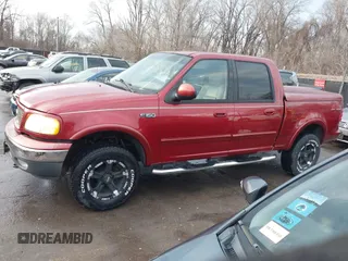 2003 Ford F-150 XLT with VIN 1FTRW08L33KC93082, listed as a IAAI auction lot 41157260 with 240,481 mi miles. Bid and sale history available at carsss.com. Image 14.