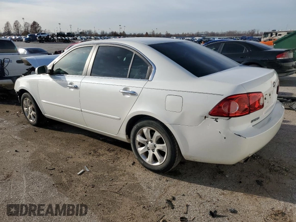 2007 Kia Optima EX with VIN KNAGE124475134560, listed as a Copart auction lot 85564384 with 106,233 mi miles and Salvage Title. Bid and sale history available at carsss.com. Image 2.