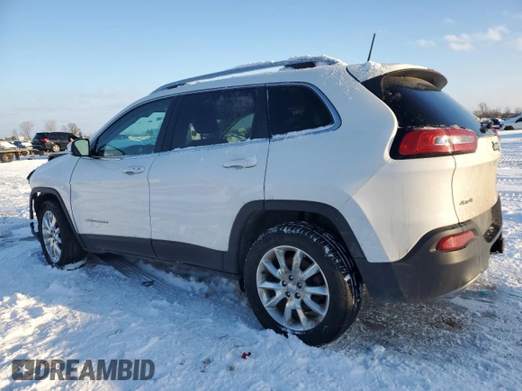 2016 Jeep Cherokee Limited with VIN 1C4PJMDS0GW149773, listed as a Copart auction lot 43604975 with 218,685 mi miles and Salvage title. Bid and sale history available at DreamBid. Image 2.