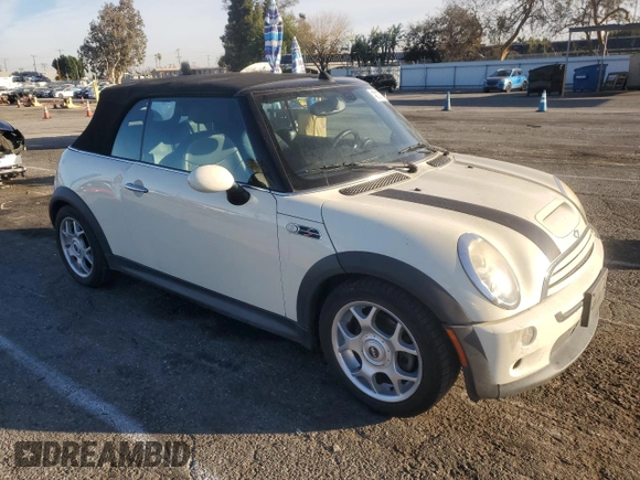 2007 MINI Convertible S with VIN WMWRH33567TL94957, listed as a Copart auction lot 42127775 with 90,401 mi miles and Salvage title. Bid and sale history available at DreamBid. Image 4.