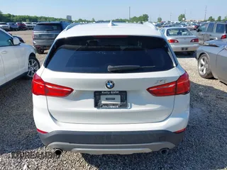 2018 BMW X1 xDrive28i z VIN WBXHT3C34J5F89162, wystawiony jako IAAI lot #42254400 z przebiegiem 131 979 mil mil oraz . Historia ofert i sprzedaży dostępna na DreamBid. Obrazek 16.