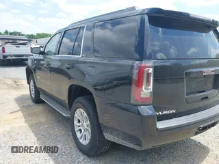 2015 GMC Yukon SLT with VIN 1GKS2BKC5FR275085, listed as a IAAI auction lot 42025693 with Not Provided miles. Bid and sale history available at carsss.com. Image 3.