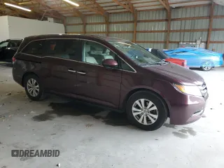 2014 Honda Odyssey EX-L with VIN 5FNRL5H64EB030633, listed as a Copart auction lot 57848505 with 160,496 mi miles and Salvage title. Bid and sale history available at DreamBid. Image 4.