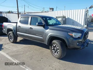 2018 Toyota Tacoma SR5 with VIN 3TMAZ5CN3JM074297, listed as a IAAI auction lot 41646257 with 143,132 mi miles and . Bid and sale history available at DreamBid. Image 1.