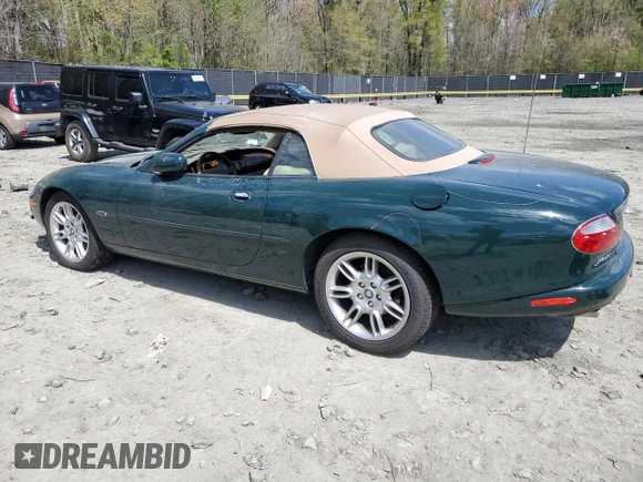 2002 Jaguar XK with VIN SAJDA42C22NA23724, listed as a Copart auction lot 53521005 with 61,468 mi miles and Salvage Title. Bid and sale history available at DreamBid. Image 2.
