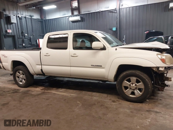 2009 Toyota Tacoma with VIN 5TEMU52N89Z620734, listed as a IAAI auction lot 41365825 with 336,070 mi miles and . Bid and sale history available at DreamBid. Image 13.