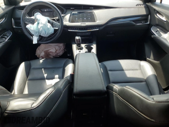 2023 Cadillac XT4 AWD Sport с VIN 1GYFZFR46PF209320, выставлен на аукционе Copart как лот 55662565 с пробегом 25 665 миль миль и Списание • Salvage title. История ставок и продаж доступна на DreamBid. Изображение 8.