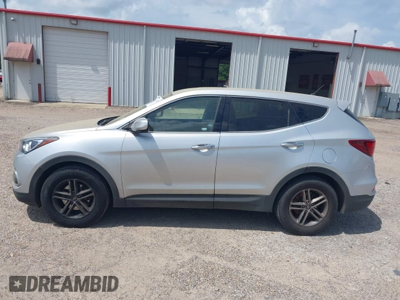 2018 Hyundai Santa Fe 2.4L with VIN 5XYZT3LB4JG557373, listed as a IAAI auction lot 42511741 with 142,572 mi miles and . Bid and sale history available at DreamBid. Image 15.