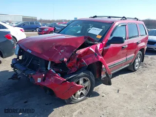 2005 Jeep Grand Cherokee Laredo with VIN 1J4GR48K55C651268, listed as a IAAI auction lot 41987117 with 189,974 mi miles. Bid and sale history available at carsss.com. Image 18.