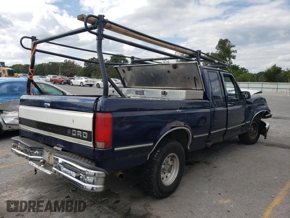 1994 Ford F-150 with VIN 1FTEX15N8RKB92877, listed as a Copart auction lot 70970604 with 232,173 mi miles and Salvage Title. Bid and sale history available at carsss.com. Image 3.