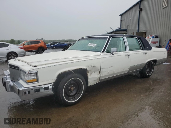 1992 Cadillac Brougham with VIN 1G6DW54E5NR708009, listed as a Copart auction lot 56849345 with 83,203 mi miles and Salvage title. Bid and sale history available at DreamBid. Image 1.