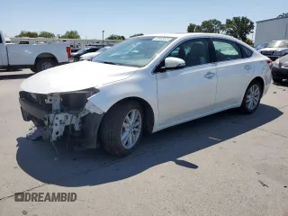 2013 Toyota Avalon XLE with VIN 4T1BK1EB7DU065991, listed as a Copart auction lot 63063675 with 107,951 mi miles and Salvage title. Bid and sale history available at DreamBid. Image 1.