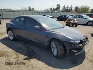 2023 Tesla Model 3 Long Range with VIN 5YJ3E1EB2PF389041, listed as a Copart auction lot 53450725 with 27,060 mi miles and Salvage Title. Bid and sale history available at DreamBid. Image 4.