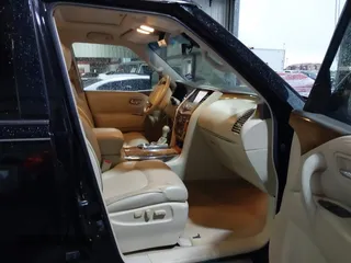2014 Infiniti QX80 z VIN JN8AZ2NF9E9555118, wystawiony jako IAAI lot #41168367 z przebiegiem 177 662 mil mil oraz . Historia ofert i sprzedaży dostępna na DreamBid. Obrazek 5.