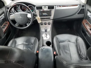 2010 Chrysler Sebring Limited z VIN 1C3CC5FB5AN172298, wystawiony jako Copart lot #52951805 z przebiegiem 146 996 mil mil oraz Szkoda całkowita • Salvage title. Historia ofert i sprzedaży dostępna na DreamBid. Obrazek 8.