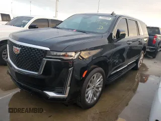 2023 Cadillac Escalade z VIN 1GYS3KKL3PR360009, wystawiony jako Copart lot #77258524 z przebiegiem 12 874 mil mil oraz Szkody całkowita. Historia ofert i sprzedaży dostępna na DreamBid. Obrazek 1.