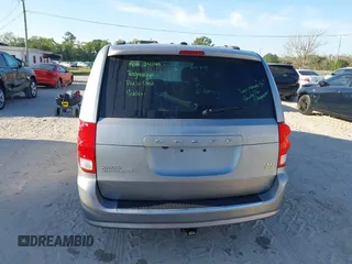 2018 Dodge Grand Caravan SXT with VIN 2C4RDGCG5JR267428, listed as a IAAI auction lot 41877661 with 103,633 mi miles and . Bid and sale history available at DreamBid. Image 17.