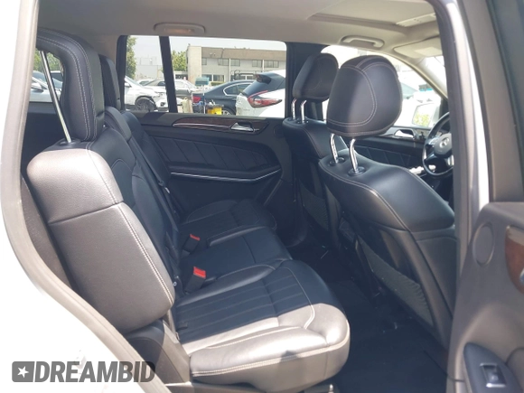 2014 Mercedes-Benz GL 450 z VIN 4JGDF7CE9EA411572, wystawiony jako IAAI lot #42461631 z przebiegiem 121 885 mil mil oraz . Historia ofert i sprzedaży dostępna na DreamBid. Obrazek 8.