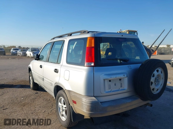1999 Honda CR-V LX with VIN JHLRD284XXC019021, listed as a IAAI auction lot 41031098 with 204,206 mi miles. Bid and sale history available at carsss.com. Image 3.