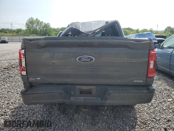 2021 Ford F-150 XL with VIN 1FTFW1E8XMFC22903, listed as a Copart auction lot 57840855 with 66,127 mi miles and Salvage title. Bid and sale history available at DreamBid. Image 6.